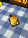 Kawaii Seal Golden Pudding Tray Squishy