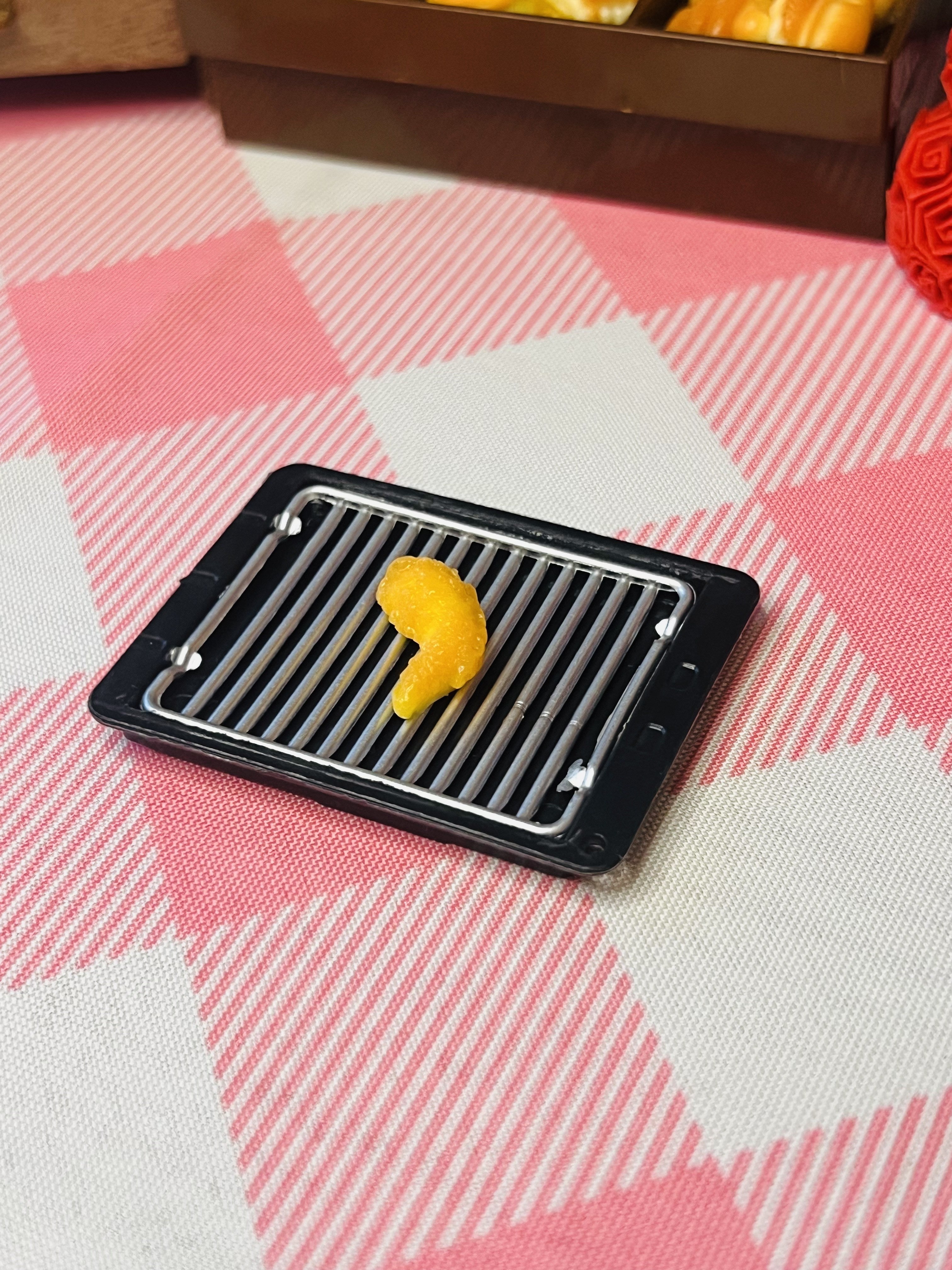 Crispy Shrimp Curl Mini Taba Squishy from Mini Street Bites Series on a cute mini food display