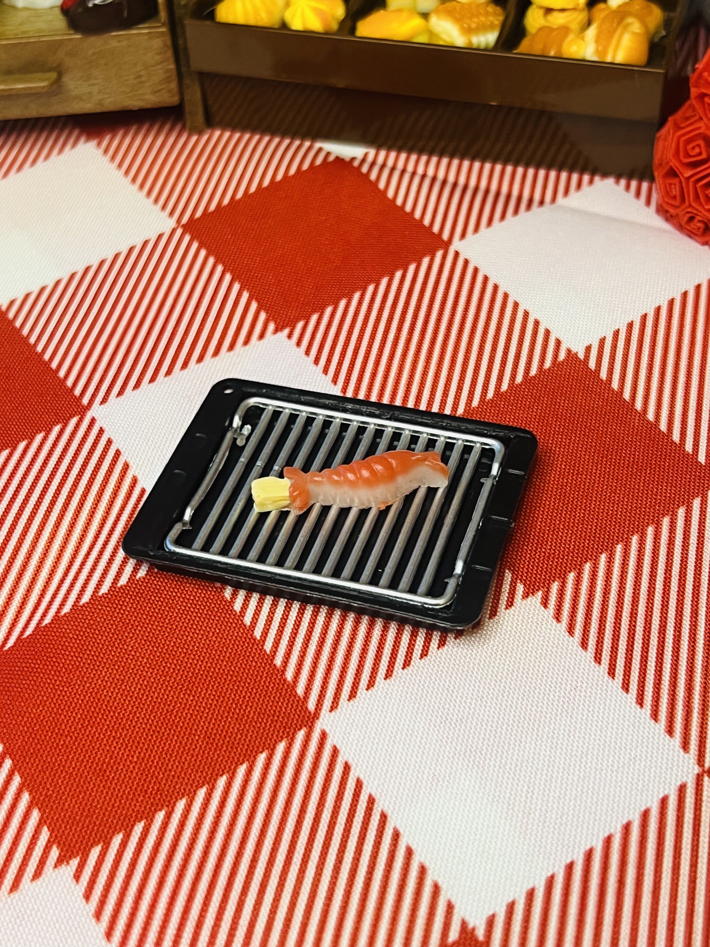 Salmon Sushi Skewer Mini Taba Squishy from Mini Street Bites Series on a cute mini food display