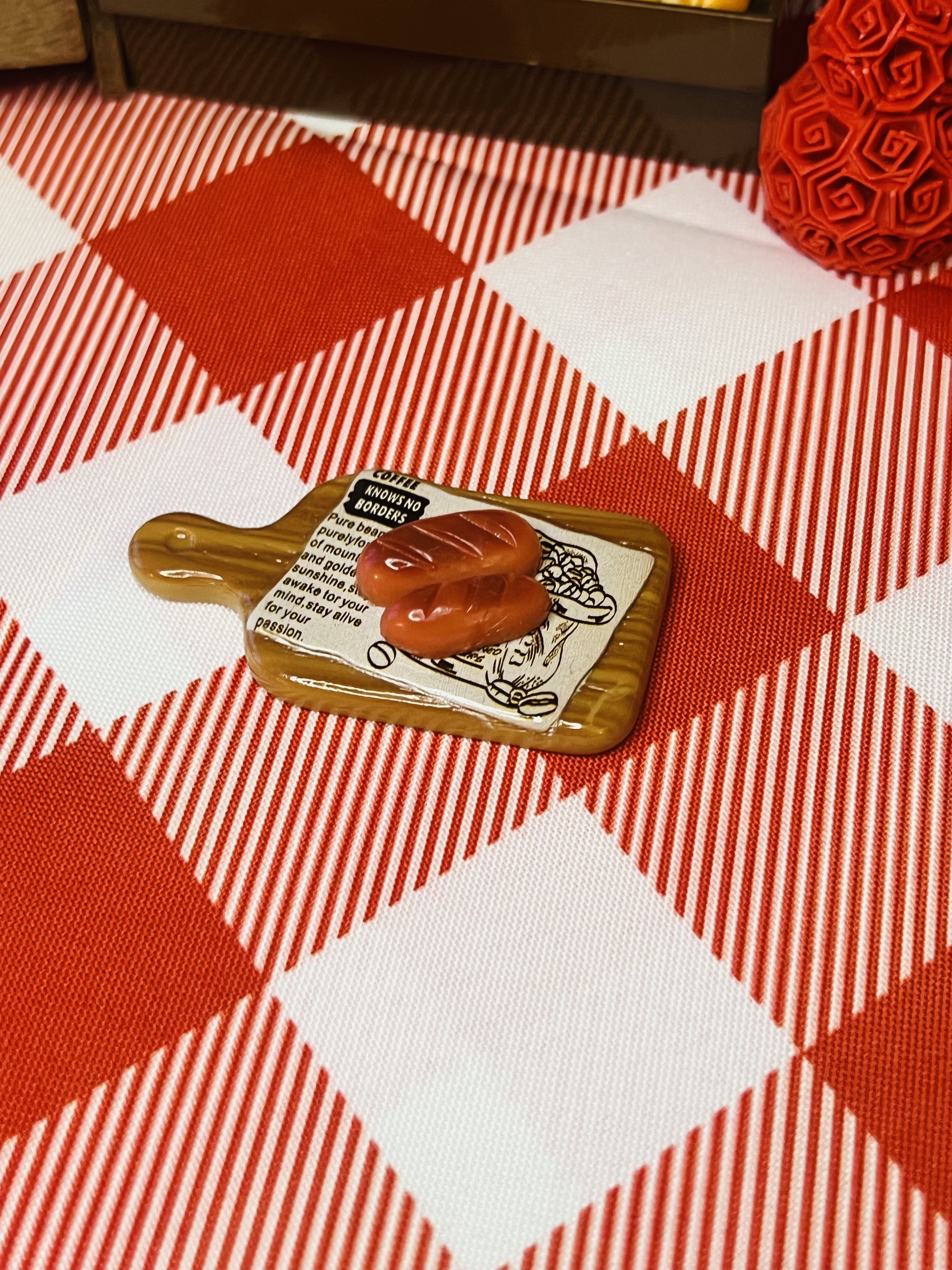 Pretzel Board Bite Mini Taba Squishy from Mini Street Bites Series on a cute mini food display