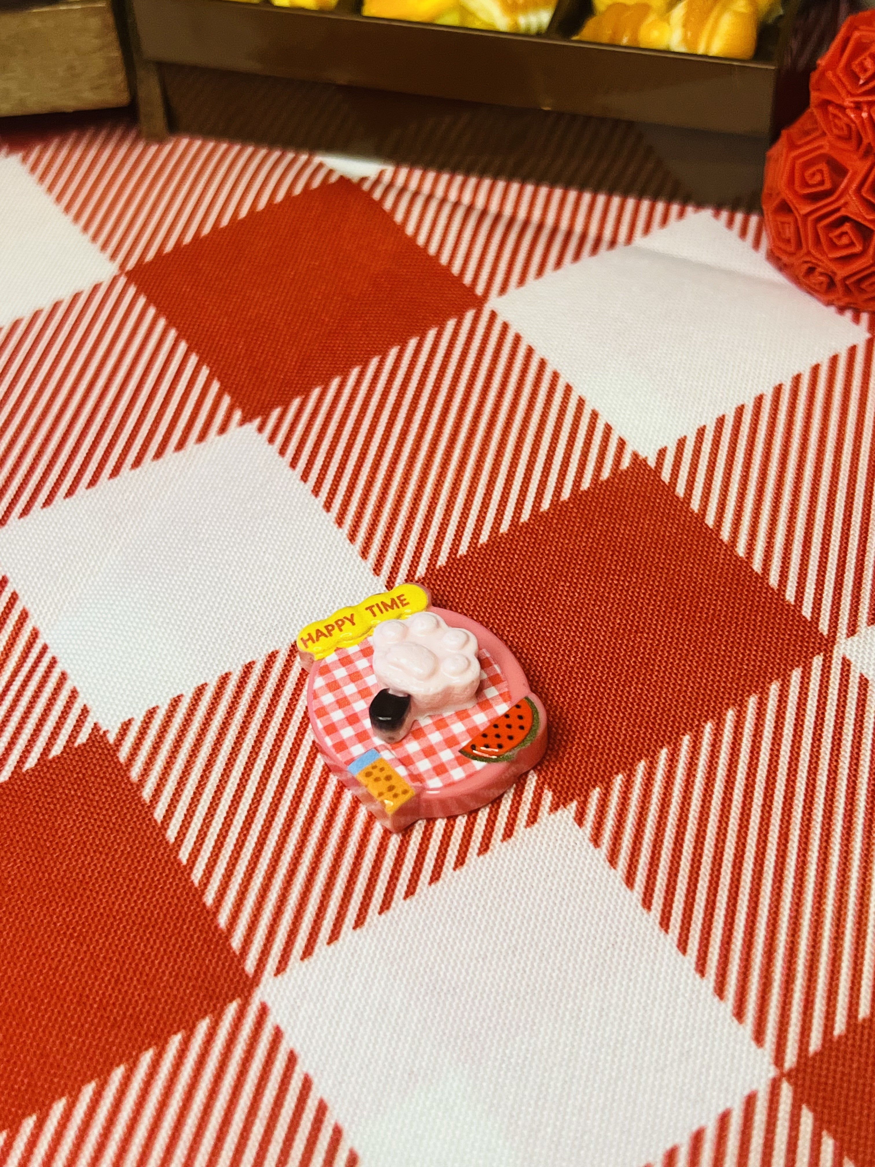 Berry Picnic Tart Mini Taba Squishy from Mini Street Bites Series on a cute mini food display