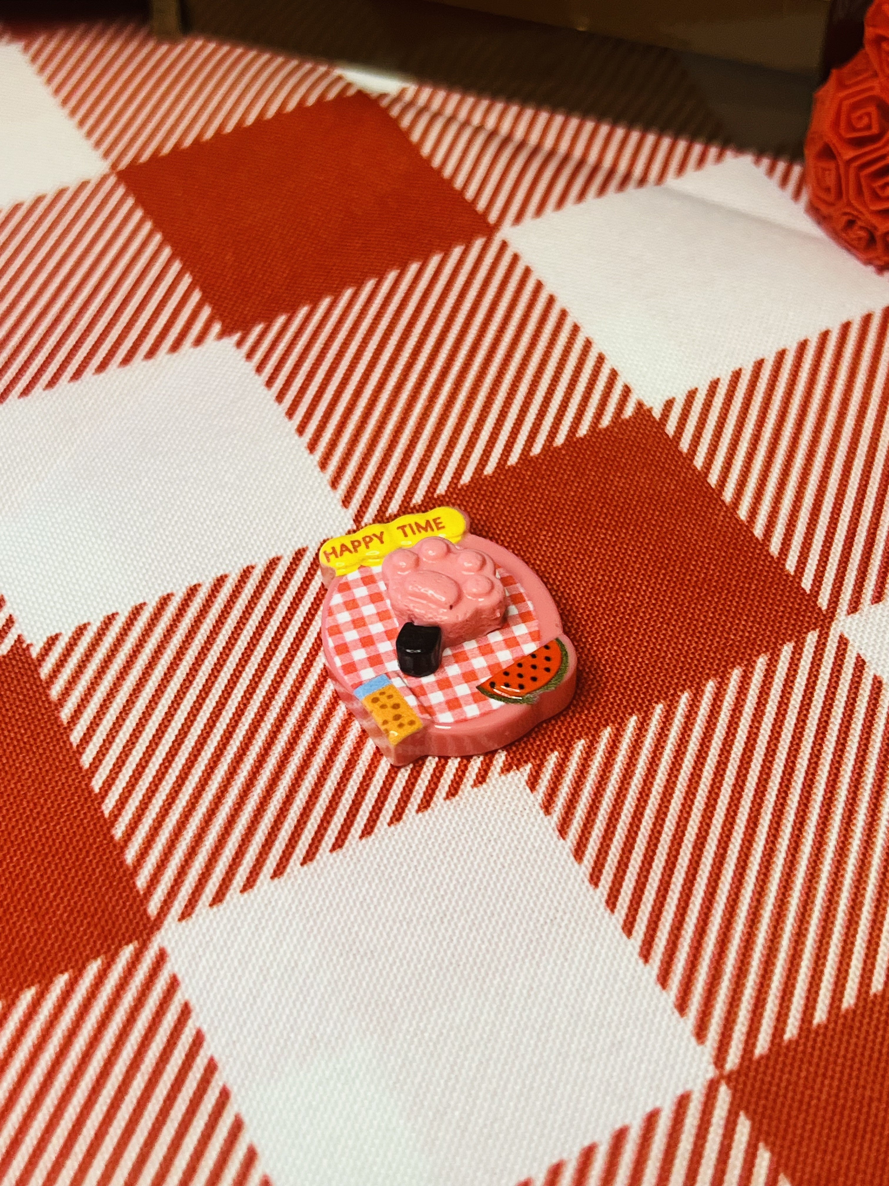 Pink Cream Picnic Tart Mini Taba Squishy from Mini Street Bites Series on a cute mini food display