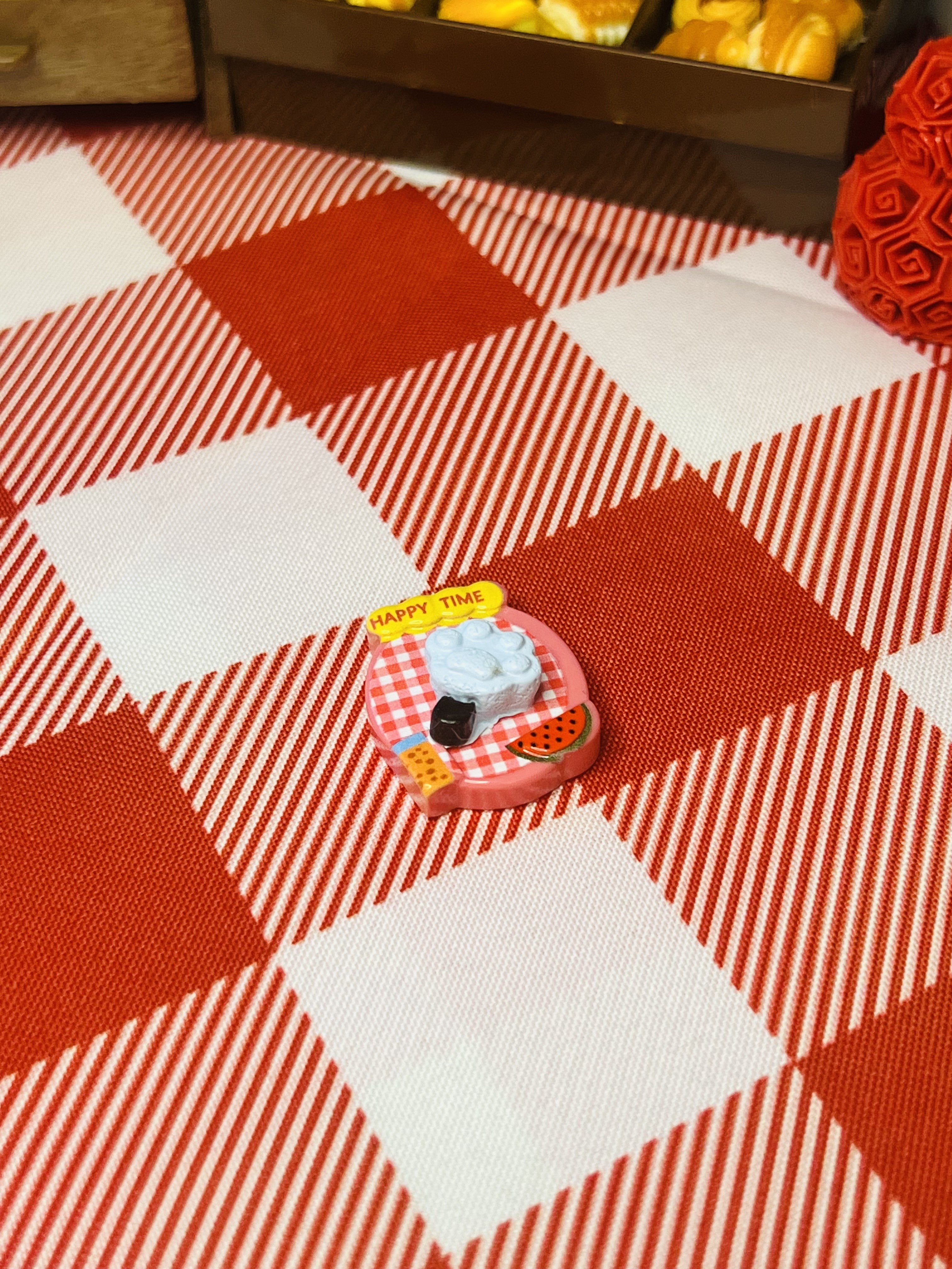 Blue Cream Picnic Tart Mini Taba Squishy from Mini Street Bites Series on a cute mini food display