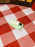 Coconut Puff Skewer Plate Mini Taba Squishy from Mini Street Bites Series on a cute mini food display
