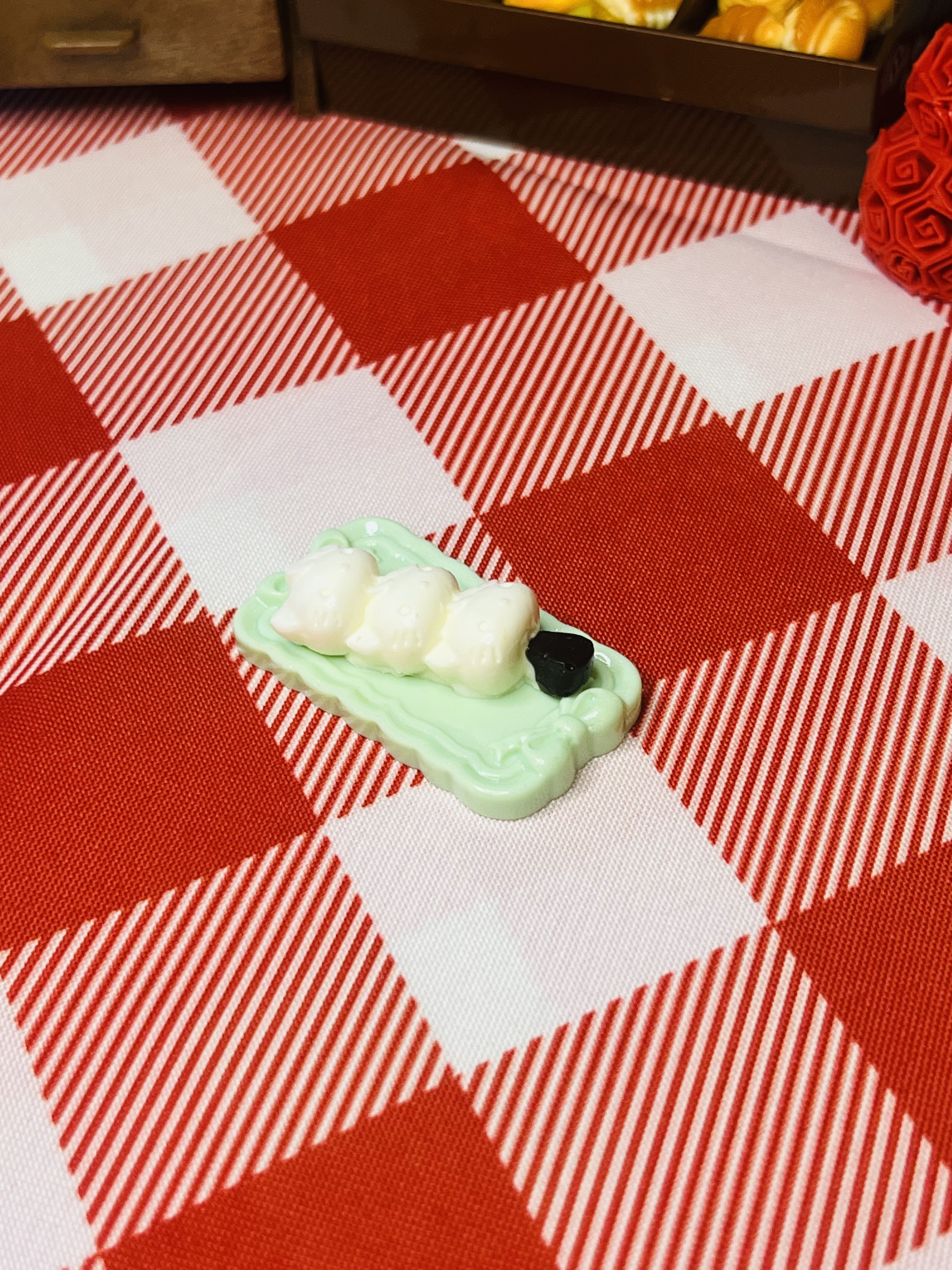 Coconut Puff Skewer Plate Mini Taba Squishy from Mini Street Bites Series on a cute mini food display