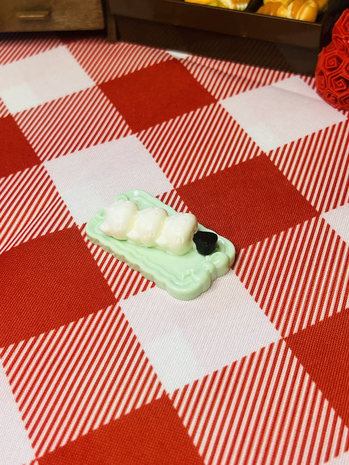 Coconut Puff Skewer Plate Mini Taba Squishy from Mini Street Bites Series on a cute mini food display