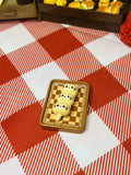 Honey Bear Dango Board Mini Taba Squishy from Mini Street Bites Series on a cute mini food display
