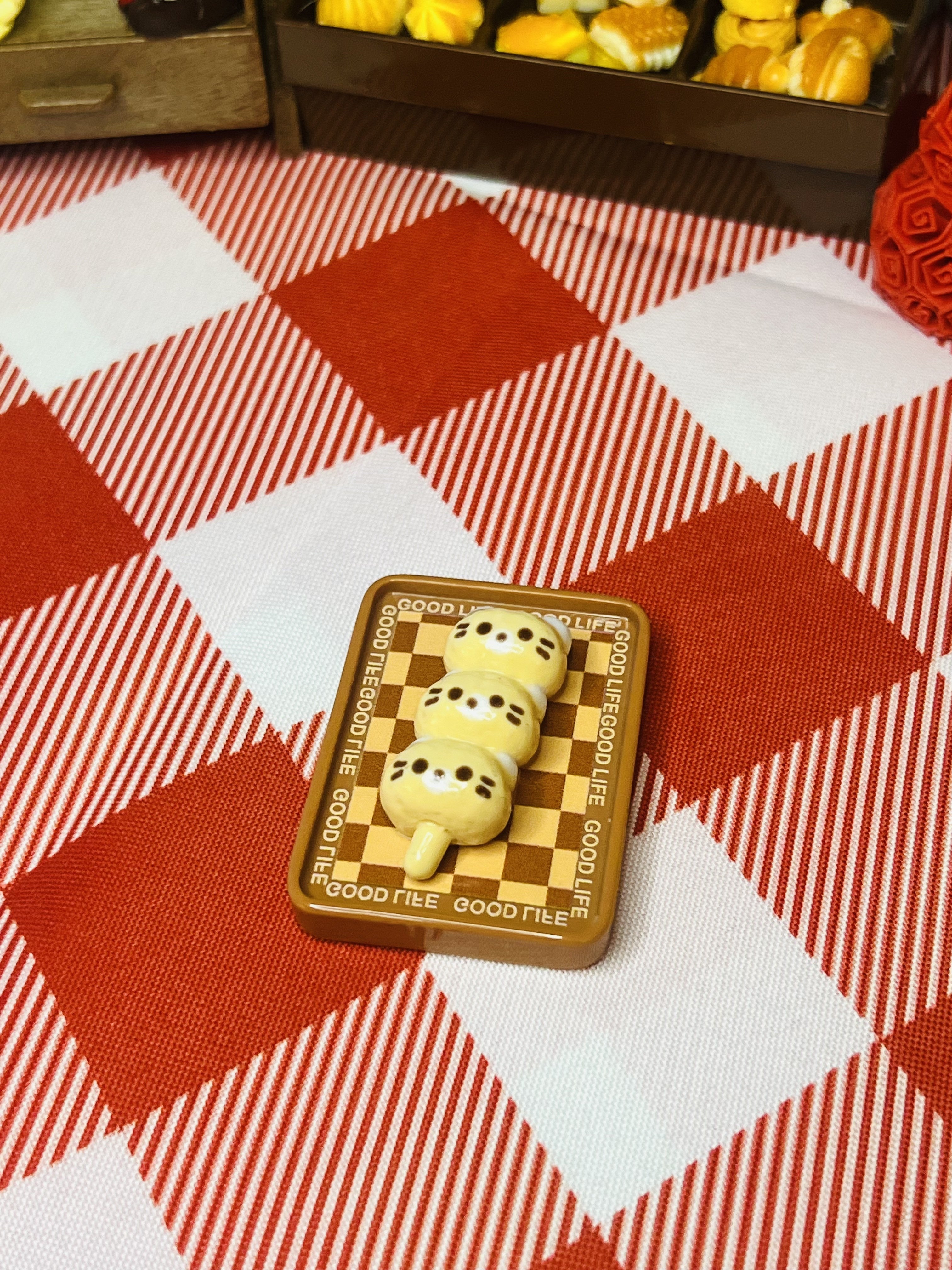 Honey Bear Dango Board Mini Taba Squishy from Mini Street Bites Series on a cute mini food display