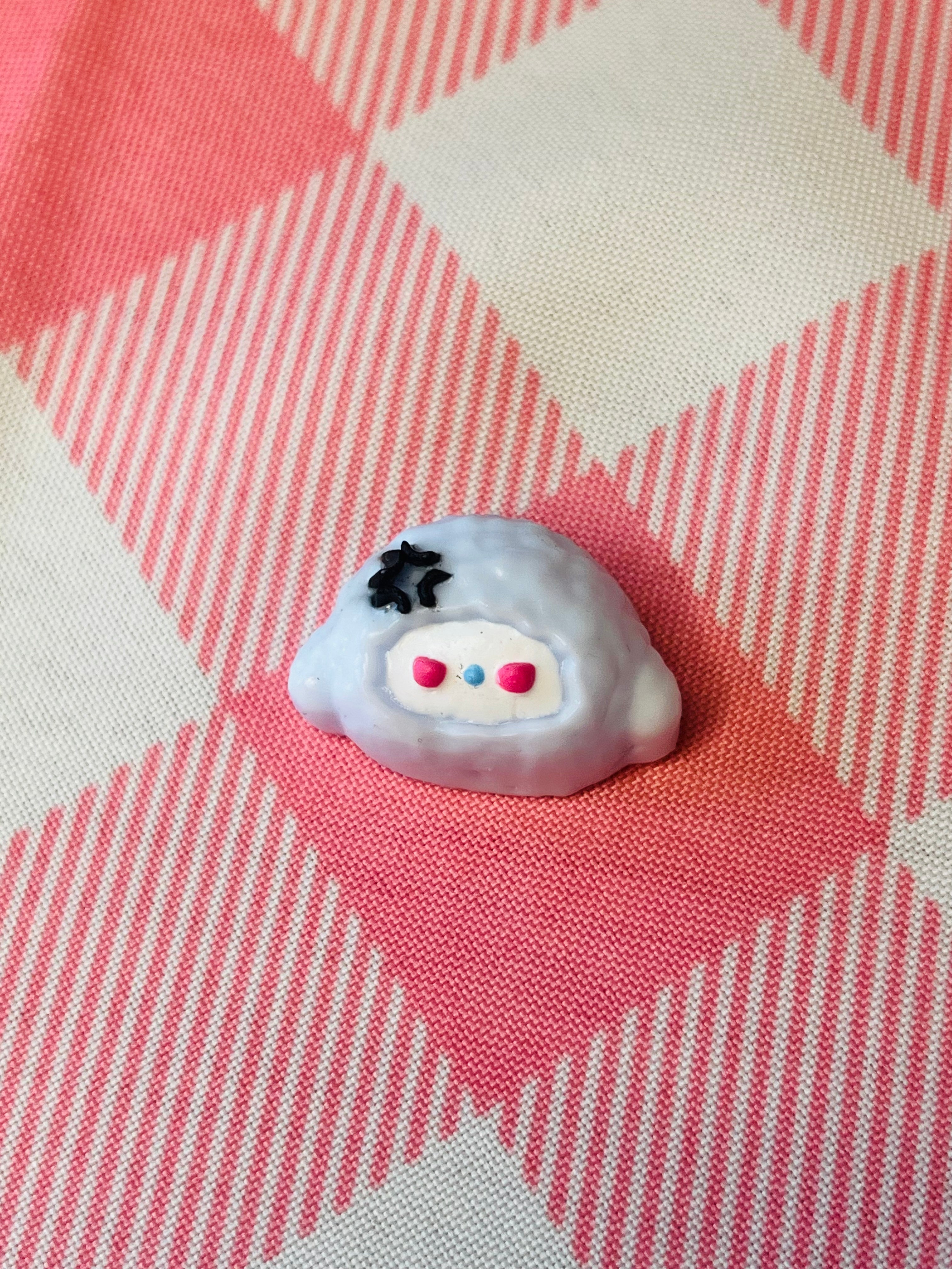 Moody Blue Bow Face Mini Taba Squishy